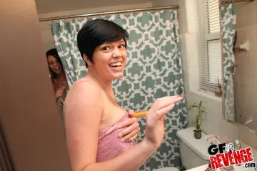 Alice Manson – Two Brunette PAWGs Share a Dildo in the Bathroom
