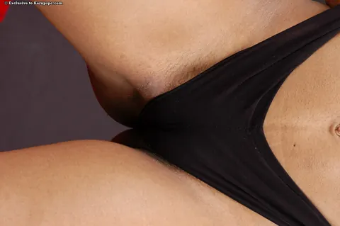 Ebony Babe Pulls Her Panties Aside to Spread Her Hairy Pussy – photo 12 of 16