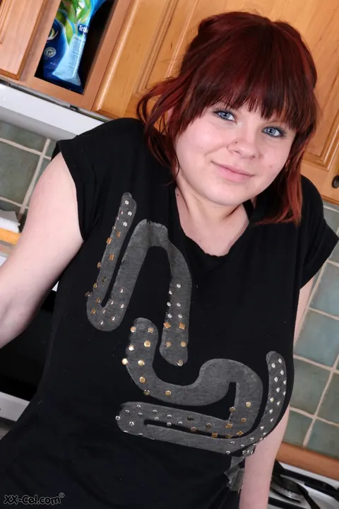 Chubby Redhead Amateur Strips Off Her Skirt and Panties in the Kitchen – photo 1 of 20