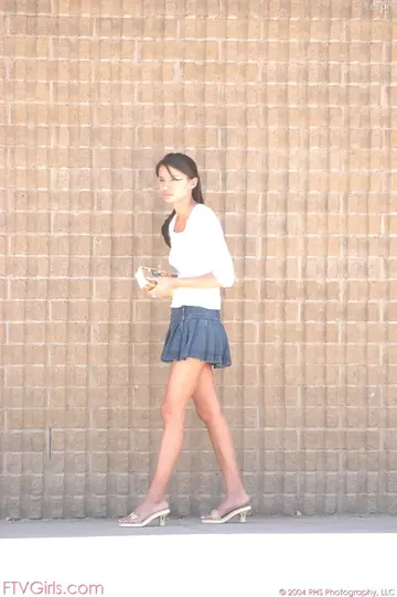 Woman in Glasses Lifts Her Skirt and Spreads Her Pussy Outdoors