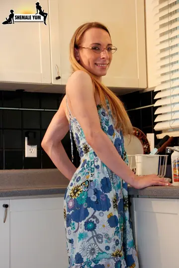 Thick Trans Woman in a Dress and Panties Gives a Blowjob