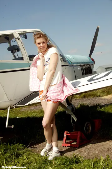 Thick Czech Brunette Uses a Vibrator on a Plane