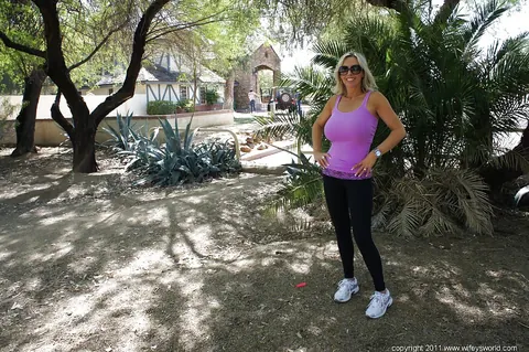 Sandra Otterson: Curvy Blonde MILF in Yoga Pants and Glasses Poses Outdoors – photo 16 of 16