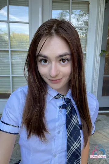 Amateur Brunette in Socks and Uniform Spreads Her Ass Cheeks