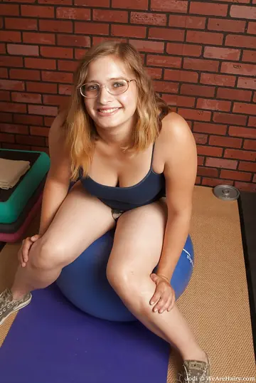 Busty Athletic Babe in Glasses Strips Out of Her Panties