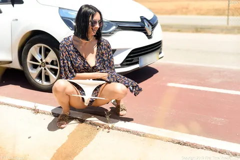 Brunette Drops Her Panties and Pisses Beside the Road – photo 13 of 20