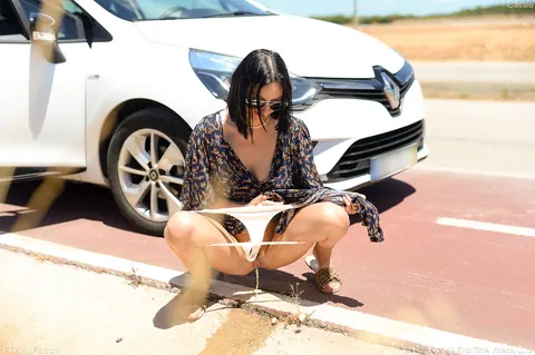 Brunette Drops Her Panties and Pisses Beside the Road – photo 11 of 20
