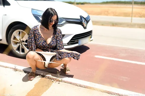 Brunette Drops Her Panties and Pisses Beside the Road – photo 12 of 20