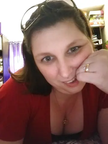 Chubby Brunette MILF Poses in a Tease