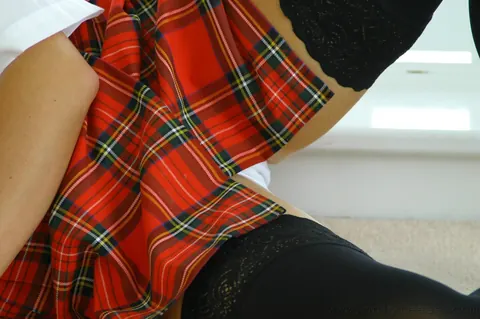 Naughty Ness: Curly Brunette with Big Enhanced Tits Poses in Stockings – photo 3 of 21