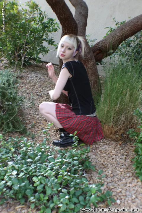 Slim Tattooed Blonde Flashes Skirt Outdoors – photo 9 of 21