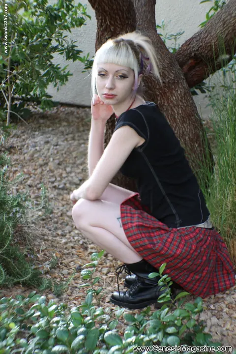 Slim Tattooed Blonde Flashes Skirt Outdoors – photo 10 of 21