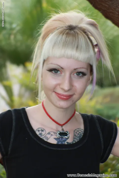 Slim Tattooed Blonde Flashes Skirt Outdoors – photo 2 of 21