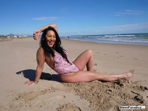 Candi Kayne: British Brunette MILF in a Bikini Spreads on the Beach – photo 3 of 12