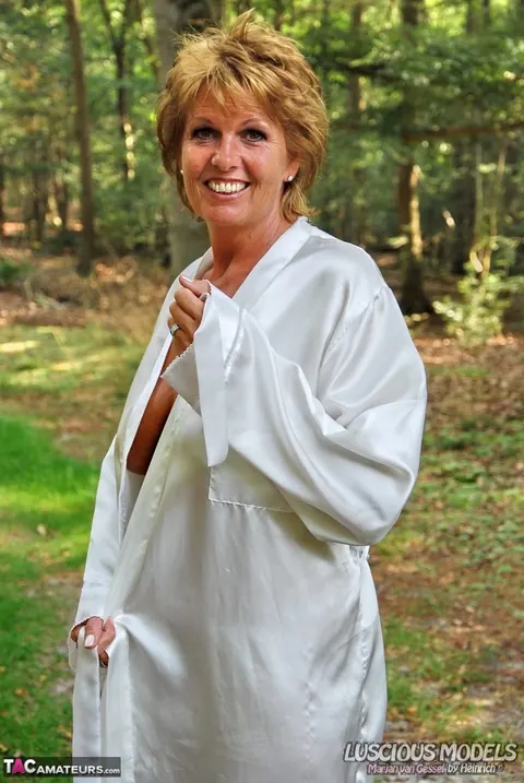European Redhead MILF Shows Her Big Tits in the Woods – photo 3 of 16