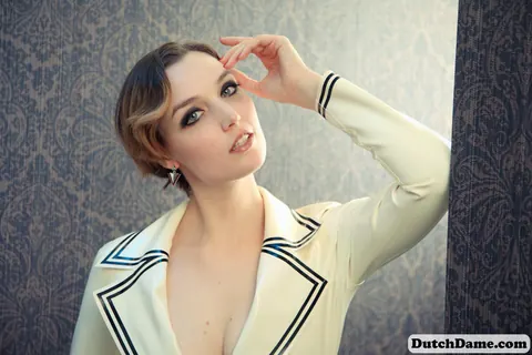 PAWG in a Latex Skirt Poses and Shows Off Her Bare Legs – photo 4 of 16