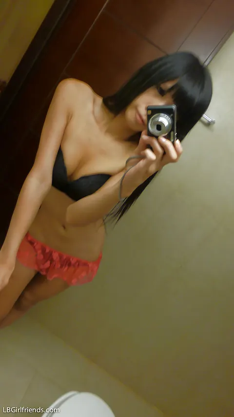 Asian Trans Woman Strips Nude and Lifts a Leg – photo 1 of 16