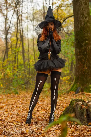 Jeny Smith – Thick Brunette in Witch Costume and Stockings Spreads in the Forest