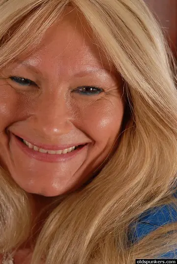 Tanned Blonde MILF Strips Off Her Lingerie to Show Her Shaved Pussy
