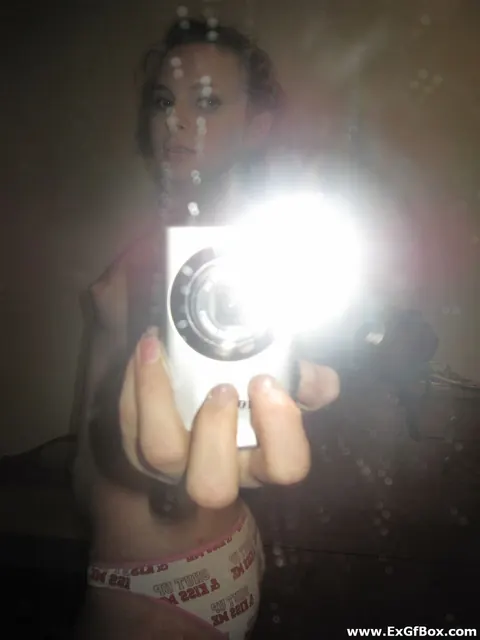Woman Strips to Panties and Snaps Topless Selfies – photo 18 of 20