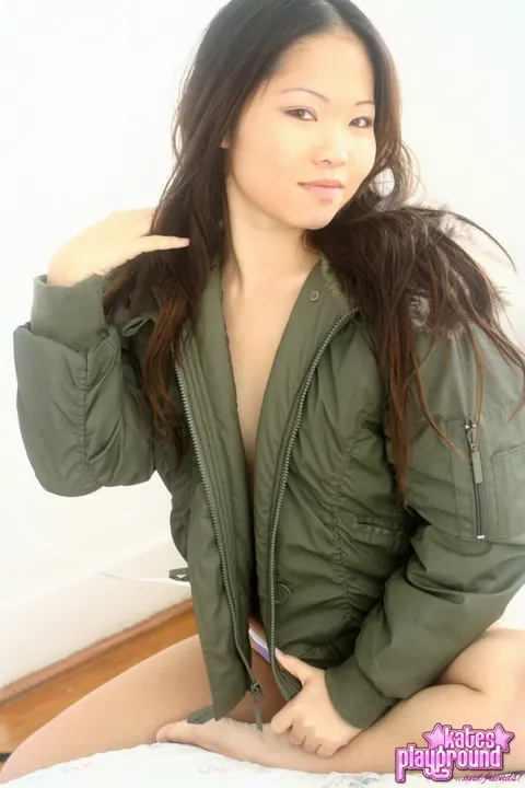 Asian Brunette Opens Winter Coat to Reveal Thong – photo 2 of 12