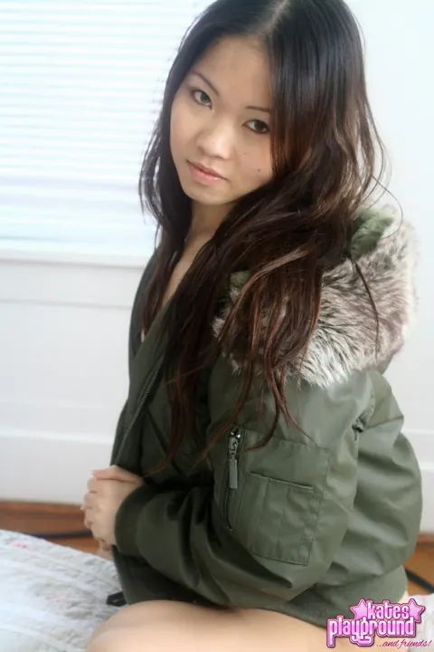 Asian Brunette Opens Winter Coat to Reveal Thong – photo 3 of 12