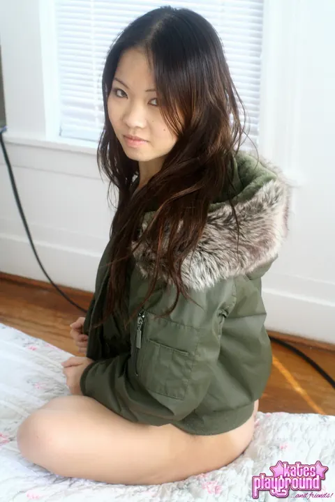 Asian Brunette Opens Winter Coat to Reveal Thong – photo 5 of 12