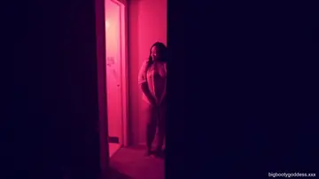 Ebony BBW Displays Her Big Tits in Low Light