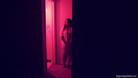 Ebony BBW Displays Her Big Tits in Low Light – photo 1 of 15