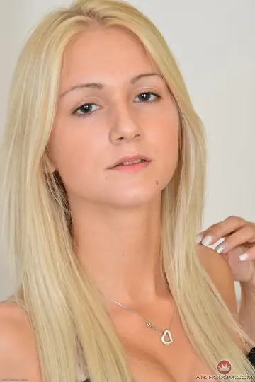 Ashley Love – Blonde with Small Natural Tits and Tattoos Strips Nude