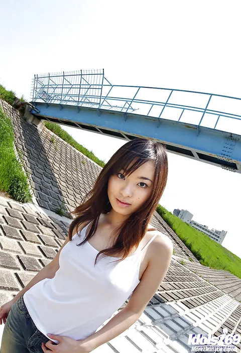 Hikaru Koto: Busty Japanese Brunette Strips Out of Her Jeans Outdoors – photo 3 of 15
