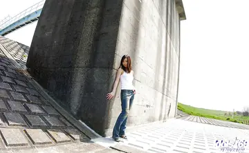 Hikaru Koto – Busty Japanese Brunette Strips Out of Her Jeans Outdoors