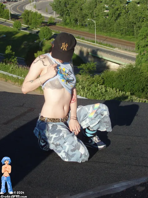 BellaVendetta: Tattooed Redhead Strips to Panties and Socks on a Rooftop Balcony – photo 6 of 15
