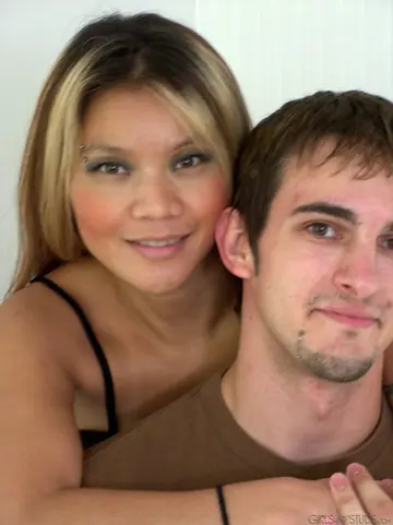 Interracial Couple Gets Naked and Fucks in the Bedroom