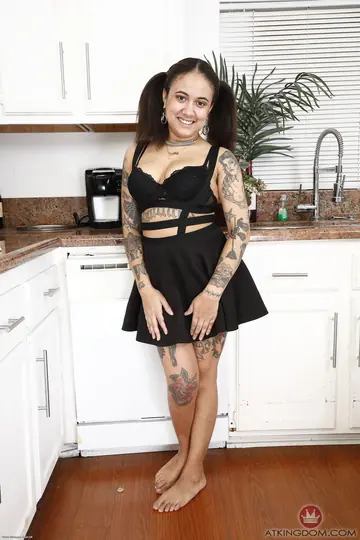 Woman Strips Nude and Displays Her Hairy Pussy