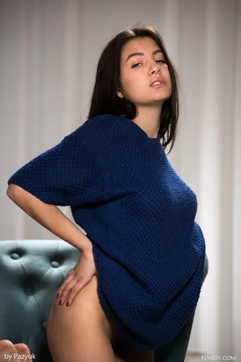 Woman Undresses and Reveals Her Hairy Bush on a Chair – photo 6 of 21