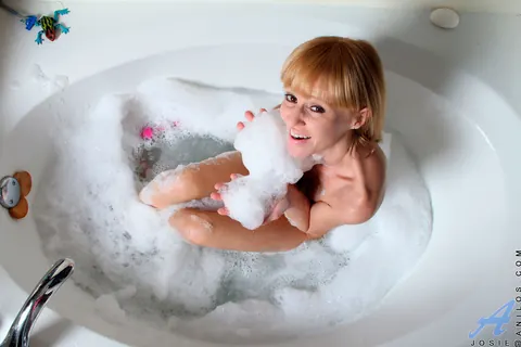 Mature Hairy Woman Masturbates with a Dildo in a Bubble Bath – photo 1 of 17