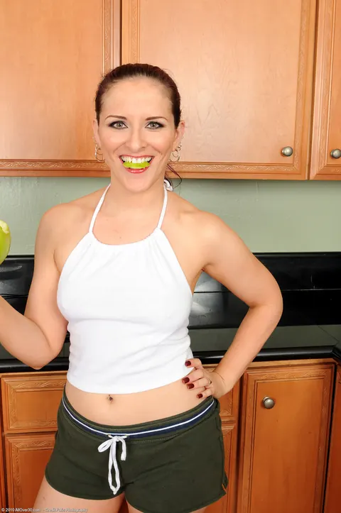 Busty MILF Spreads Her Pierced Pussy in the Kitchen – photo 3 of 21