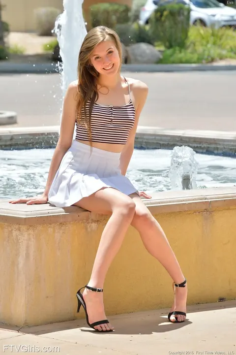 Eva Celeste: Skinny Brunette in a Skirt and Heels Spreads Outdoors – photo 1 of 20