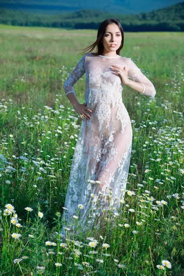Skinny Woman Strips Out of Her Dress Outdoors and Poses Nude