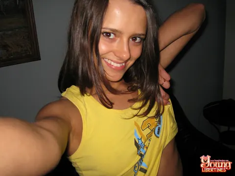 Skinny European Brunette Shows Her Shaved Pussy on the Sofa – photo 2 of 20