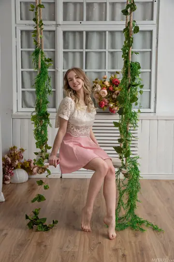 Blonde Beauty Poses in Glamour Style Showing Her Figure
