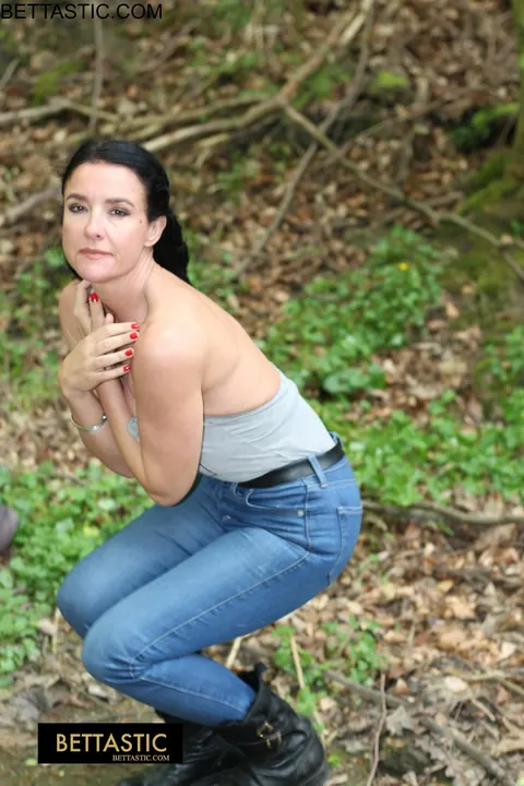 Brunette Poses Outdoors in Jeans and Turns Around – photo 3 of 15