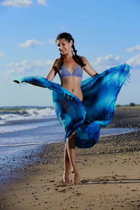 Busty Brunette in Pigtails Strips and Fingers Her Pussy on the Beach – photo 1 of 21