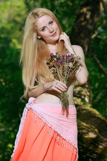 Ukrainian Blonde Undresses and Poses Nude for Glamour Set
