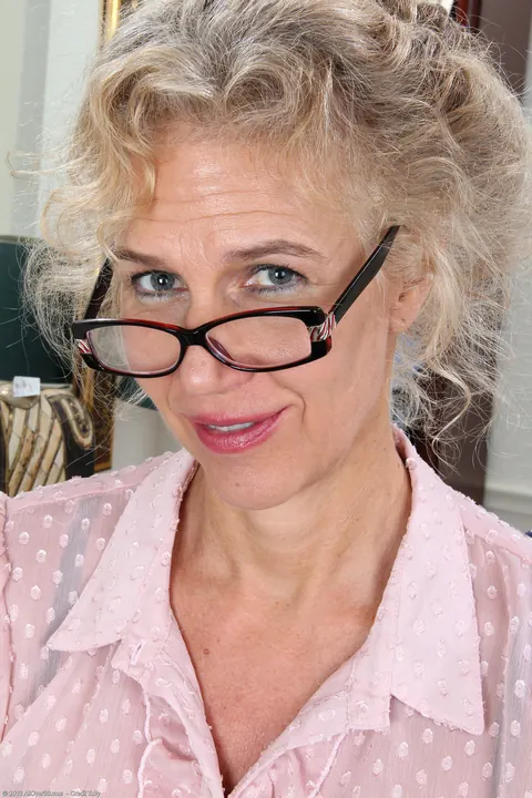 Cally Jo: Curly Blonde MILF in Glasses Strips and Spreads – photo 2 of 20