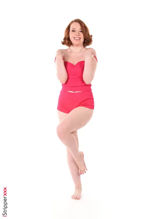 Lottie Magne: Redhead in Shorts Strips Nude and Toys Her Trimmed Pussy – photo 1 of 15