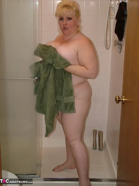 Taffy Spanx: Busty Blonde MILF Fingers Her Pussy in the Bathroom – photo 11 of 16