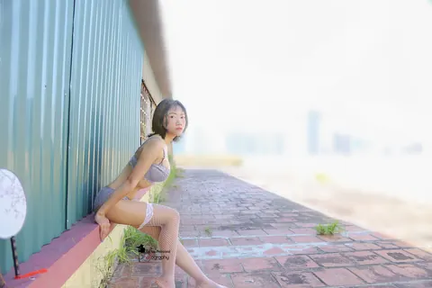 Slim Asian Brunette with Short Hair Poses in Lingerie Outdoors – photo 16 of 21