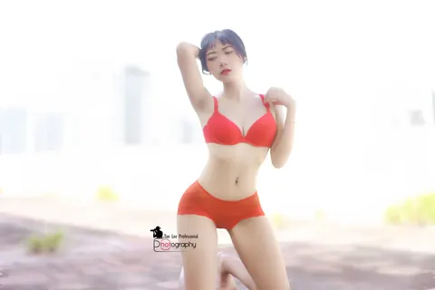 Slim Asian Brunette with Short Hair Poses in Lingerie Outdoors – photo 15 of 21